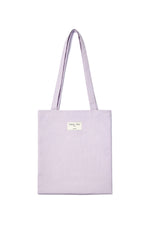 Túi tote unisex màu tím nhạt với thiết kế nhẹ và logo Matin Kim nổi bật.