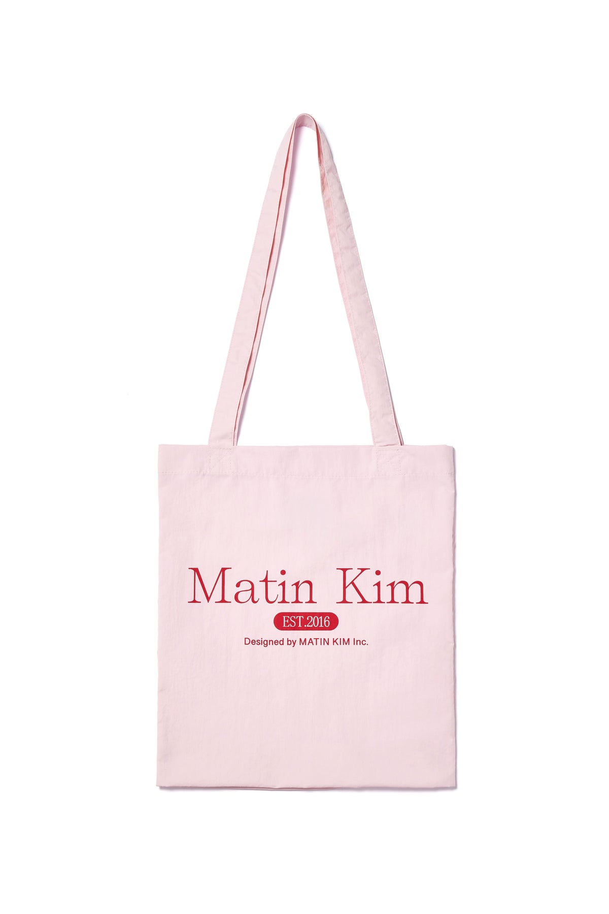 Túi tote unisex với họa tiết in và logo Matin Kim, màu hồng nổi bật.