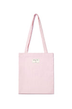 Túi tote unisex với họa tiết in và logo Matin Kim, màu hồng nổi bật.