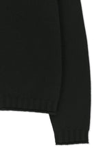 Áo khoác nữ với thiết kế cropped, dệt kim và khóa kéo, tay ôm gọn.