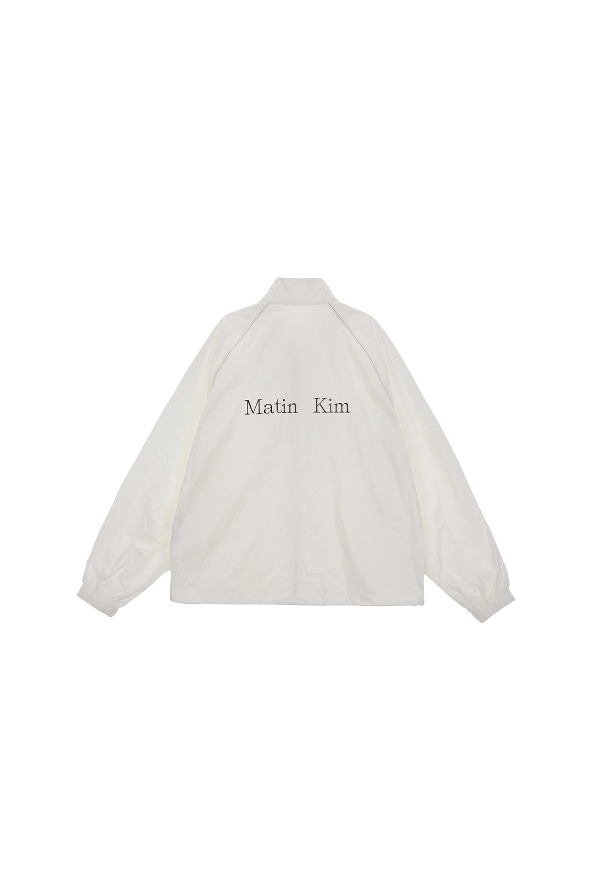 Áo khoác oversize nữ có cổ cao, tay dài, đường may rõ nét và logo Matin Kim.