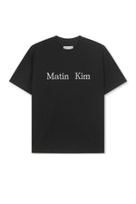 Áo unisex với thiết kế cổ tròn, tay ráp, và logo Matin Kim in lụa ngang ngực.