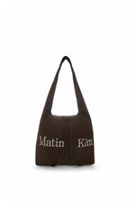 Túi tote nữ với logo Matin Kim, thiết kế hiện đại và đường may nổi bật.