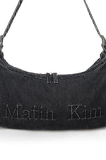 Túi đeo vai nữ với thiết kế denim và ngăn chứa tiện ích.