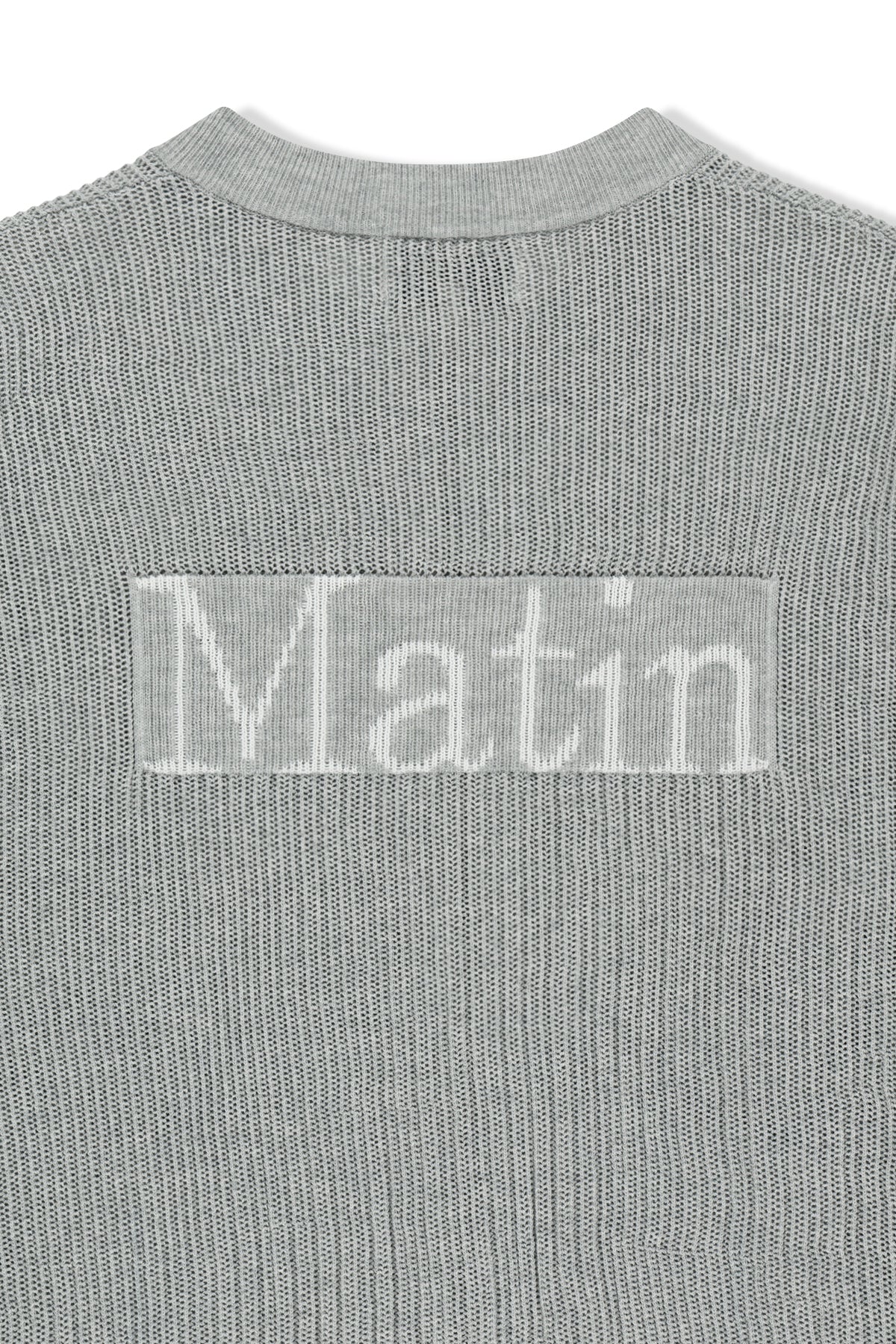 Áo len unisex với thiết kế dệt kim và logo Matin Kim nổi bật.