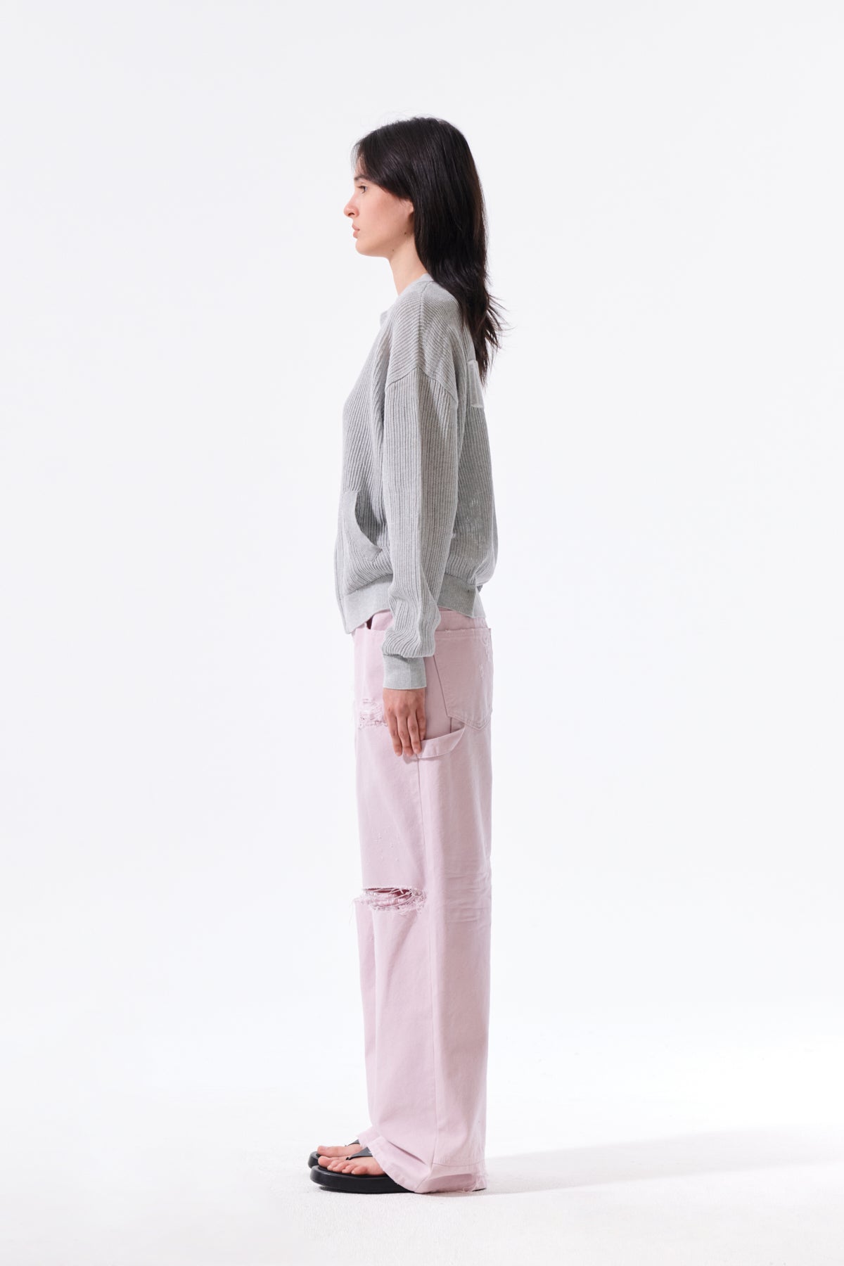 Áo len unisex với thiết kế dệt kim và logo Matin Kim nổi bật.