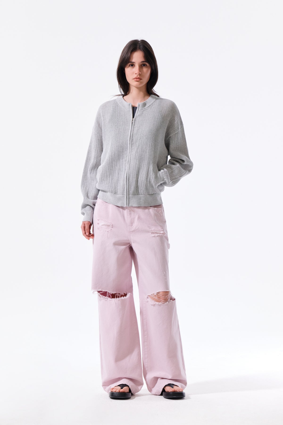 Áo len unisex với thiết kế dệt kim và logo Matin Kim nổi bật.