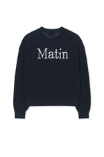 Áo len unisex với thiết kế thoáng khí, có túi trước và logo Matin Kim nổi bật.