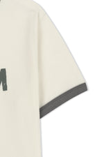 Áo phông nữ cropped với thiết kế logo Matin Kim và viền tương phản.