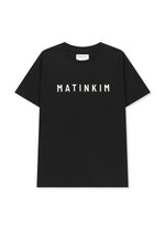 Áo top nữ với logo Matin Kim in nổi bật trên nền đen.