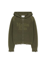 Áo sơ mi unisex màu khaki có mũ trùm, khóa kéo giữa trước, tay dài và logo Matin Kim