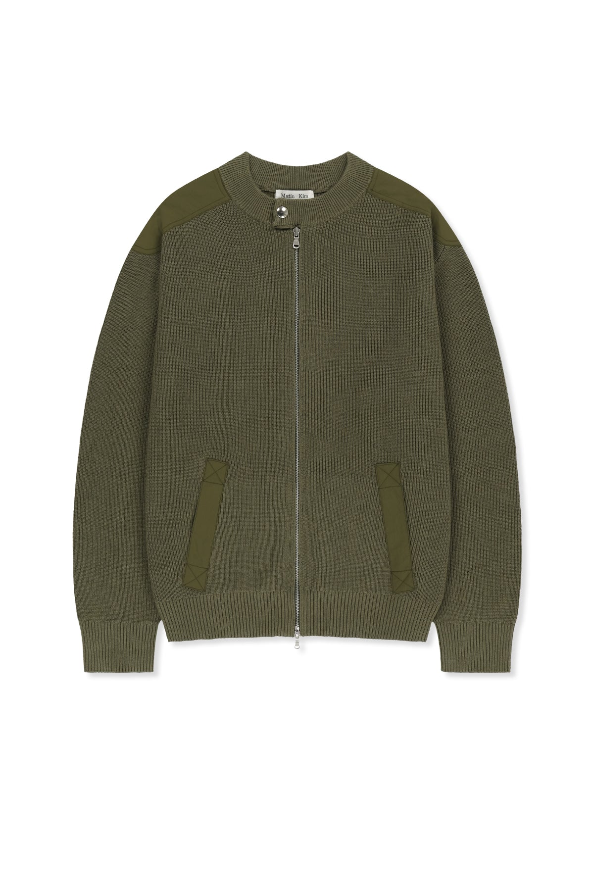 Áo sơ mi nam cotton màu khaki, tay dài, cổ tròn, có chữ ở lưng trên và hai túi hông.