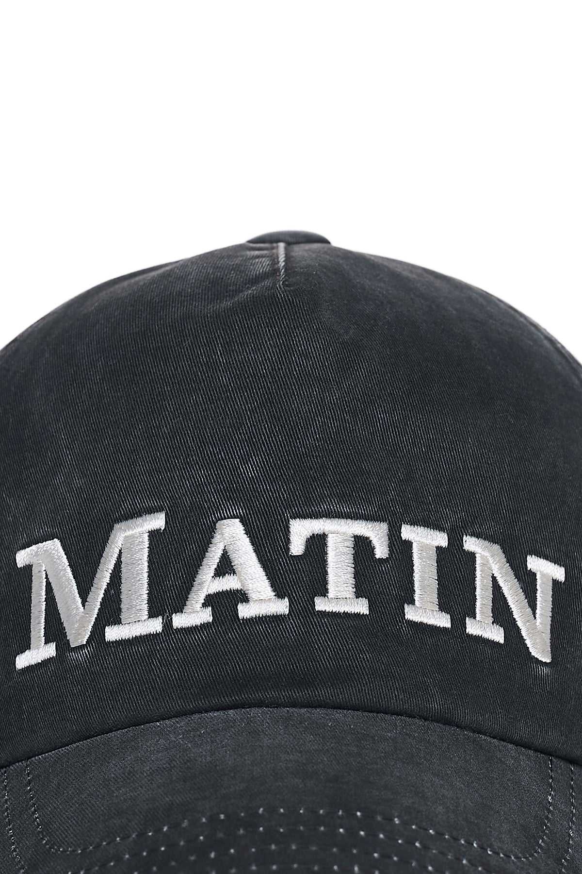 Nón bóng chày unisex màu charcoal, vành cong, logo Matin Kim thêu ở mảng trước, dây strapback phía sau.